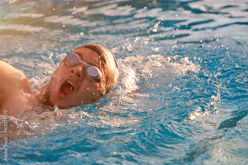 Face of swimming man