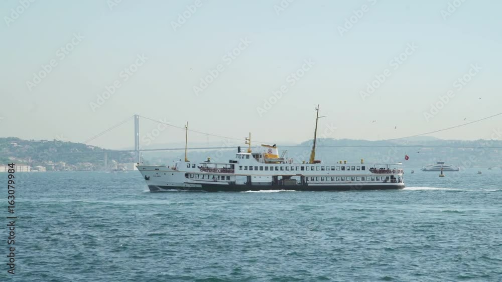 Luxury Passenger Ship in front of Bosphorus Bridge Luxury Passenger Ship in front of Bosphorus Bridge