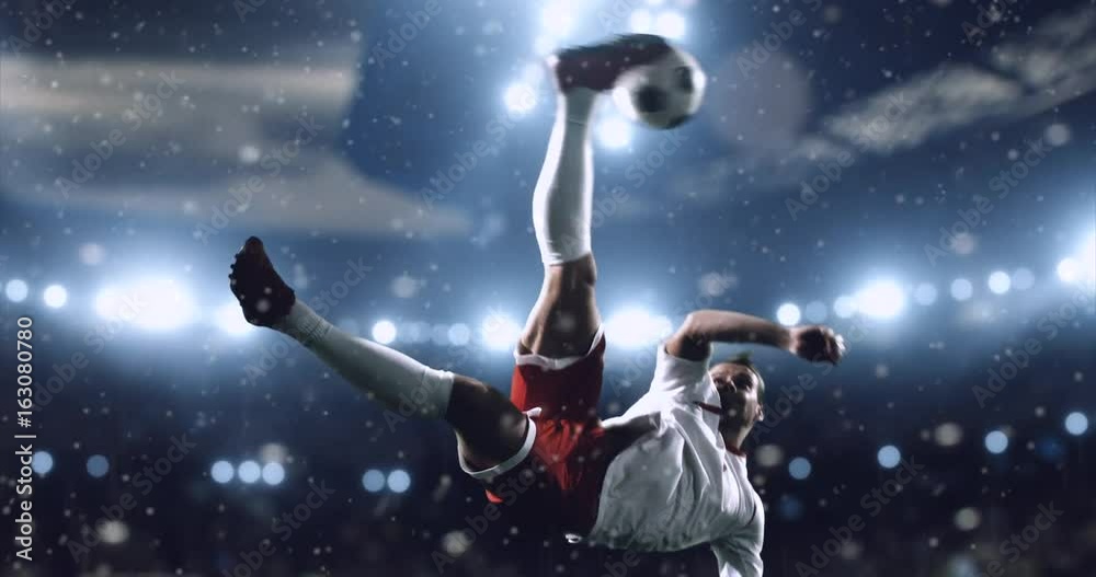 4k footage of a soccer player in dramatic play during a soccer game on a professional outdoor soccer stadium. Players wear unbranded uniform. Stadium and crowd are made in 3D.