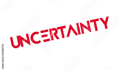 Uncertainty rubber stamp. Grunge design with dust scratches. Effects can be easily removed for a clean, crisp look. Color is easily changed.