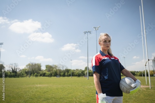 Female goalie looking away