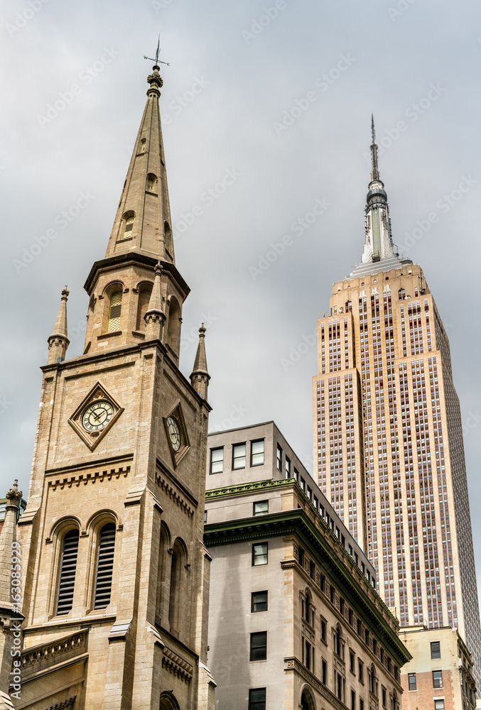 Marble Collegiate Church and Empire State Building in New York City, USA