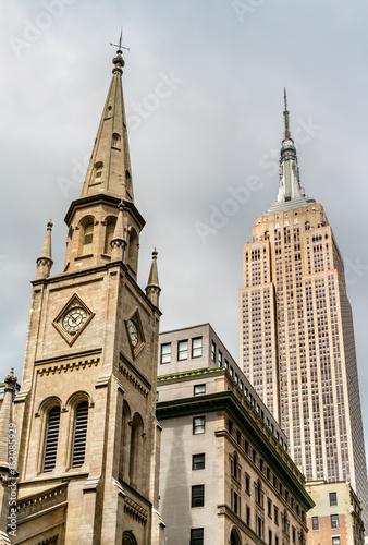 Marble Collegiate Church and Empire State Building in New York City, USA