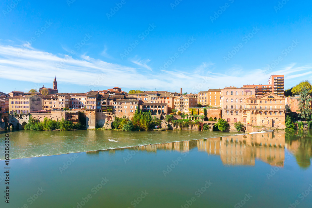 Albi in Southwestern France. Albi is a world heritage UNESCO site. View of the Tarn River and the Cathedral Saint Cecile.