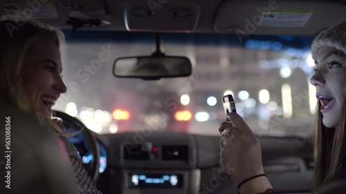 Passenger Takes Funny Photos Of Driver At A Stop Light, Then They Realize The Light Turned Green