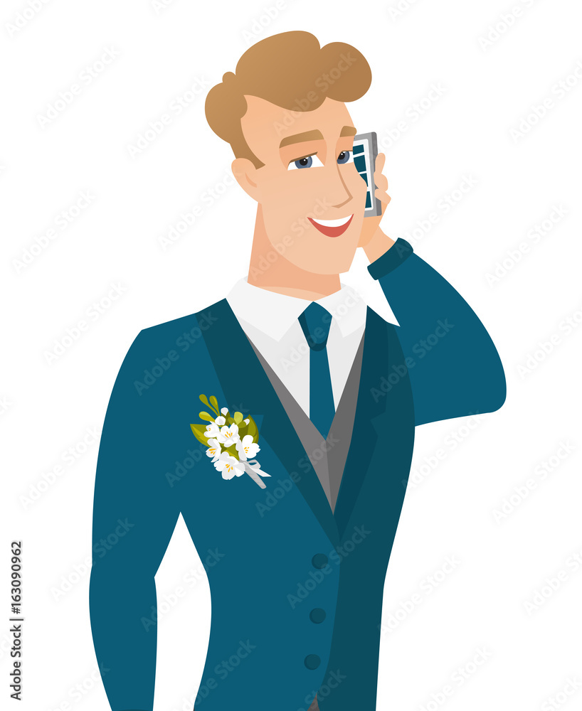 Young caucasian groom talking on a mobile phone. Young caucasian groom talking on a mobile phone.