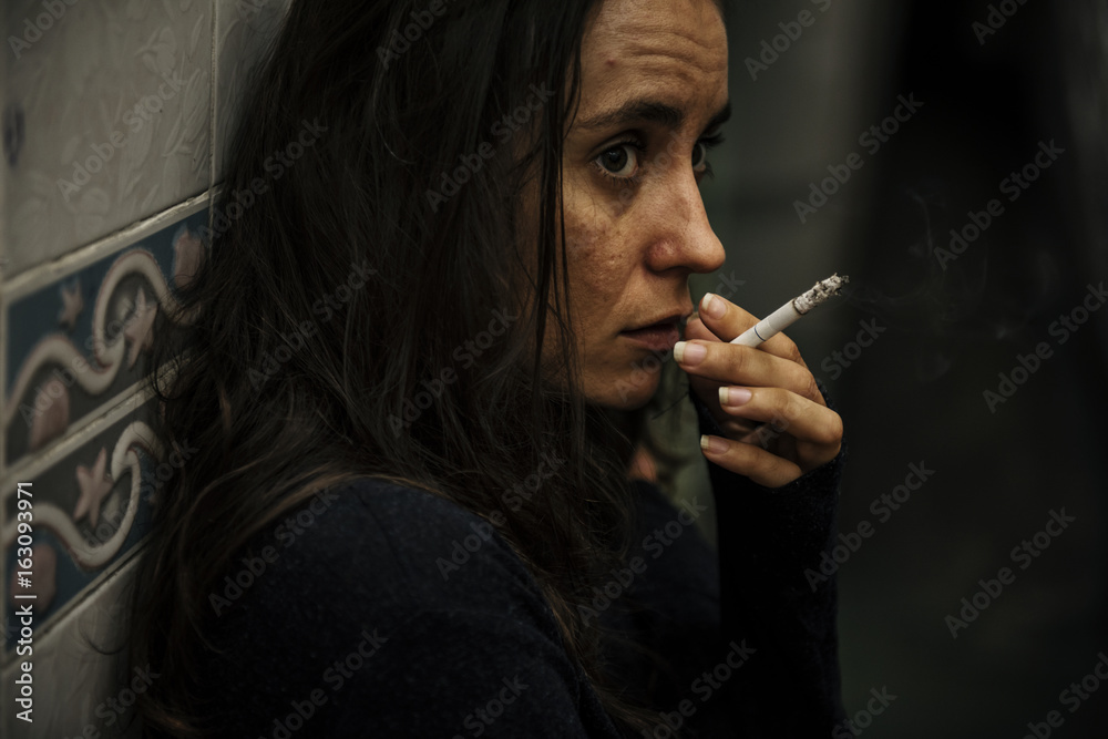 Fototapeta premium Homeless Adult Woman Smoking Cigarette Addiction