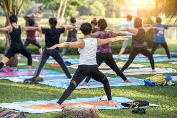 Fototapete Yogaschule Beautiful asian girl practicing yoga  © Boonchai