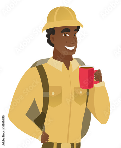 African-american traveler holding cup of coffee.