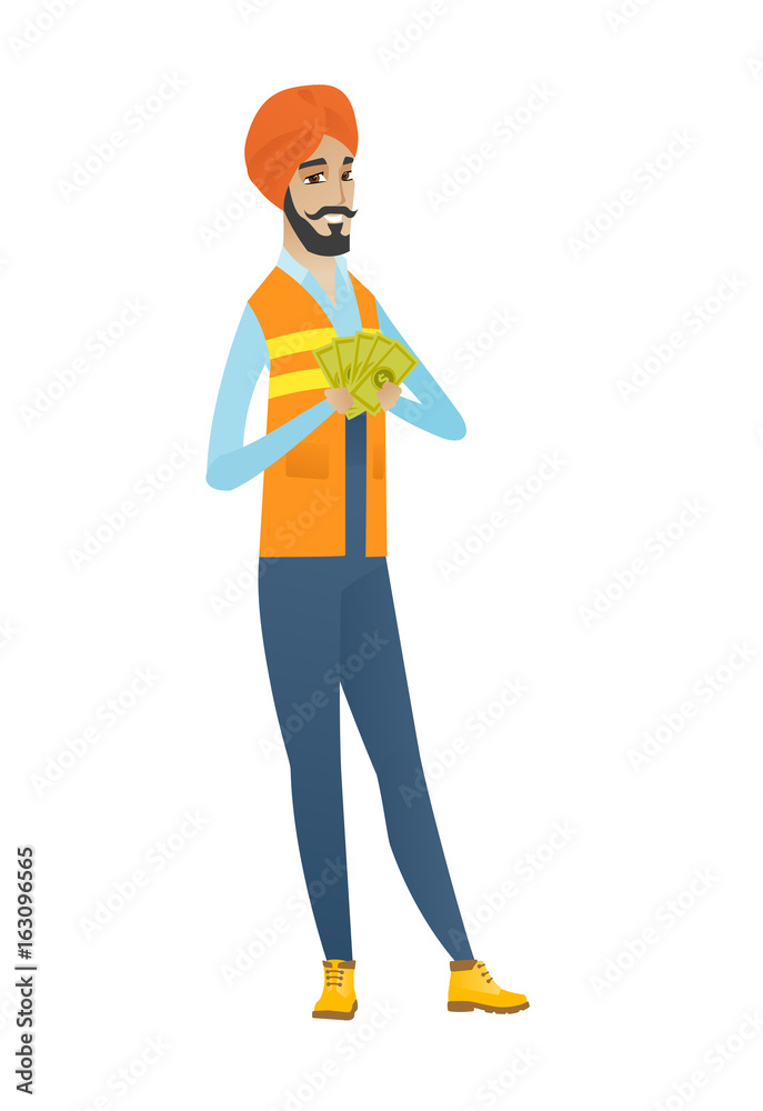 Fototapeta premium Happy hindu builder holding money.