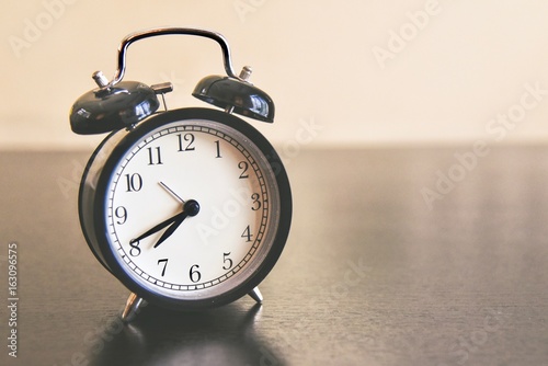Minute Hand Almost Ticking to Eight O'clock on a Morning Alarm Clock