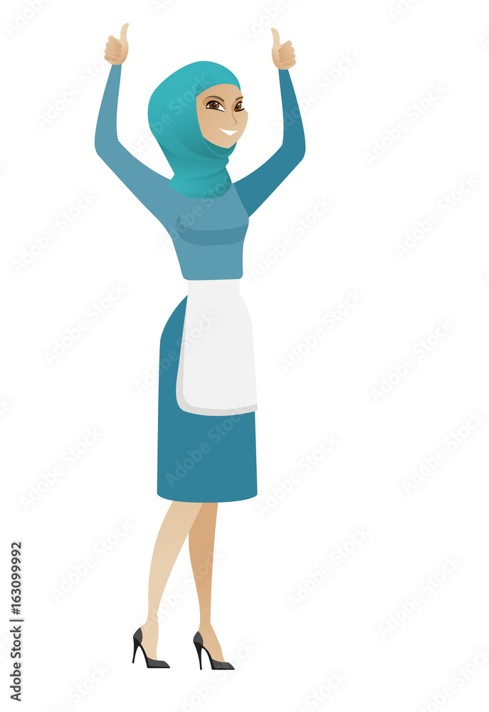 Young muslim cleaner standing with raised arms up. Young muslim cleaner standing with raised arms up.
