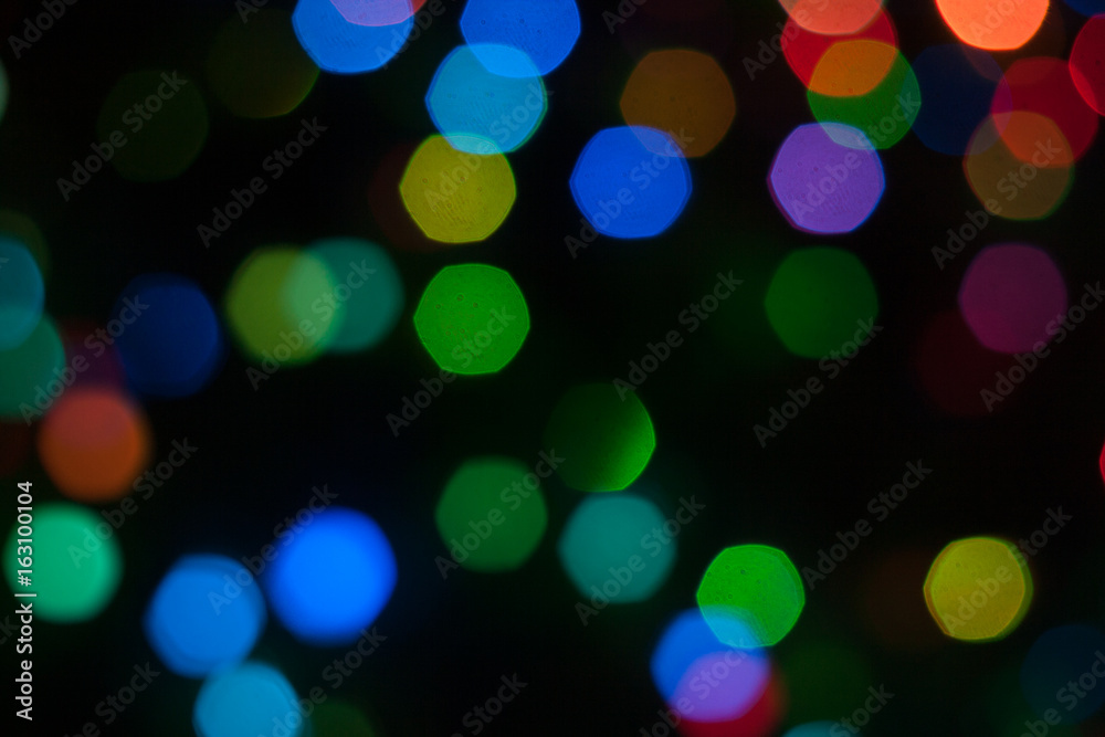 Abstract background of out of focus lights at night. Light hexagon. Blue lights in the dark.