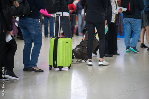 Photography Queue of Asian people waiting at boarding gate at airport