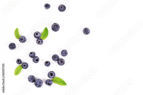 Fresh blueberry with leaf on white background
