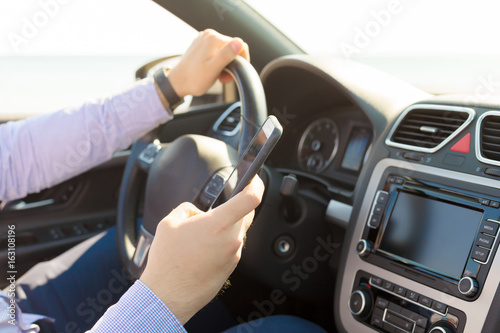 Man driving a car