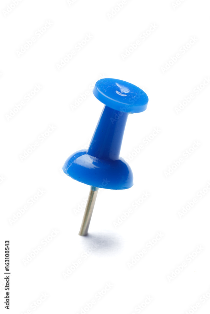 close up of a pushpin on white background