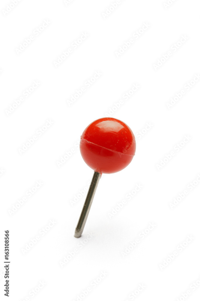 close up of a pushpin on white background