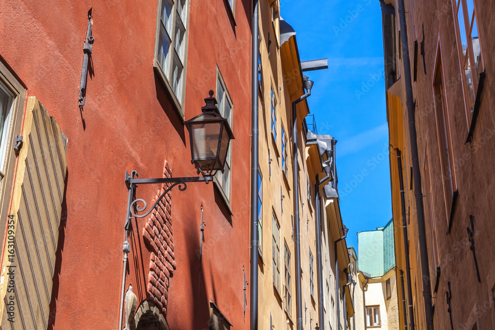 Old house facade with street light. Gamla stan