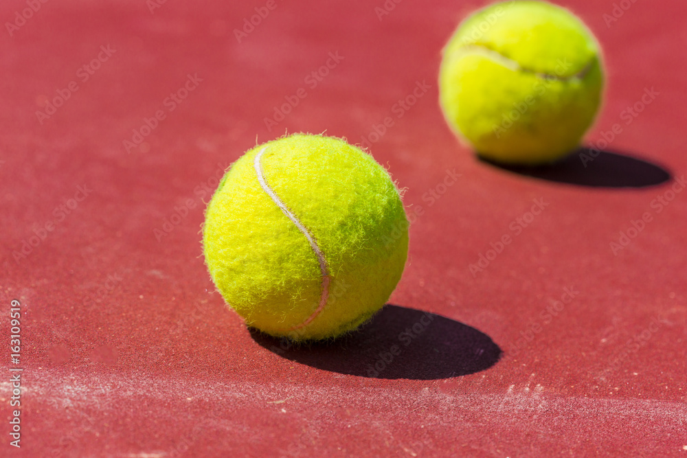 Tennis Balls on the Court