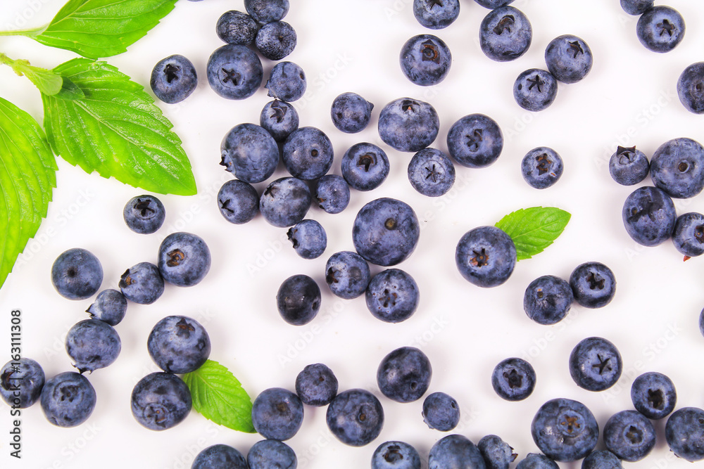 Fresh blueberry with leaf on white background Fresh blueberry with leaf on white background