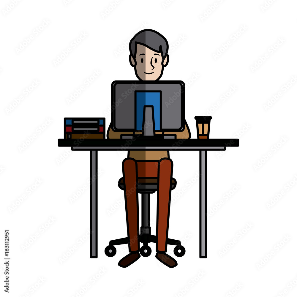 young man working on computer at office desk young man working on computer at office desk