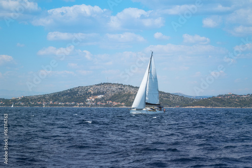 Sailboat under Full Sail at Adriatic Sea near the Island of Murter, Dalmatia, Croatia