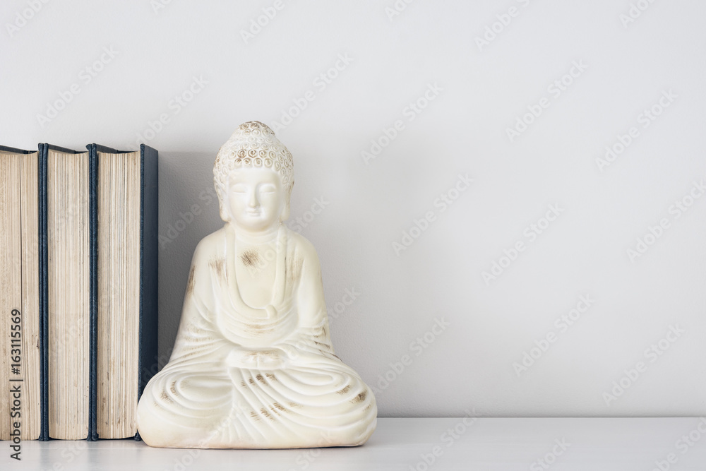 Buddha ornament book stop with copy space.