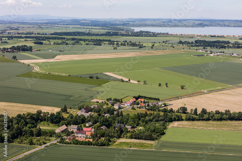 aerial view of the village and harvest fields © mariusz szczygieł