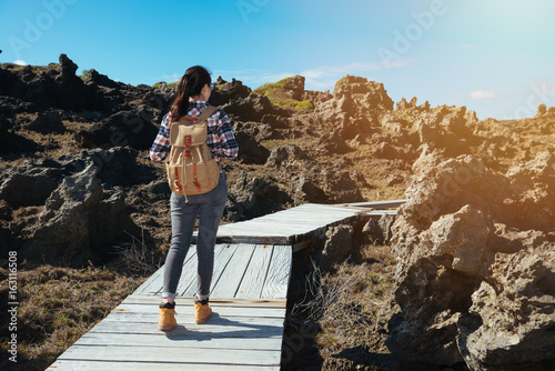 woman hiker looking view of beach