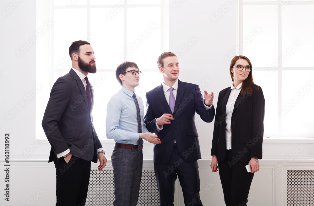Corporate meeting in office, business people with copy space Corporate meeting in office, business people with copy space