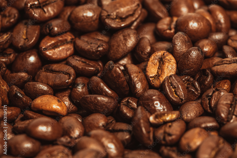 Dark many roasted coffee beans texture background Dark many roasted coffee beans texture background