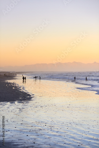 beautiful sunset along the beach © Daxiao Productions