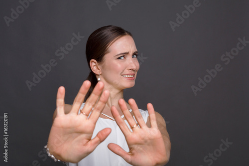 Attractive woman saying thanks but no photo