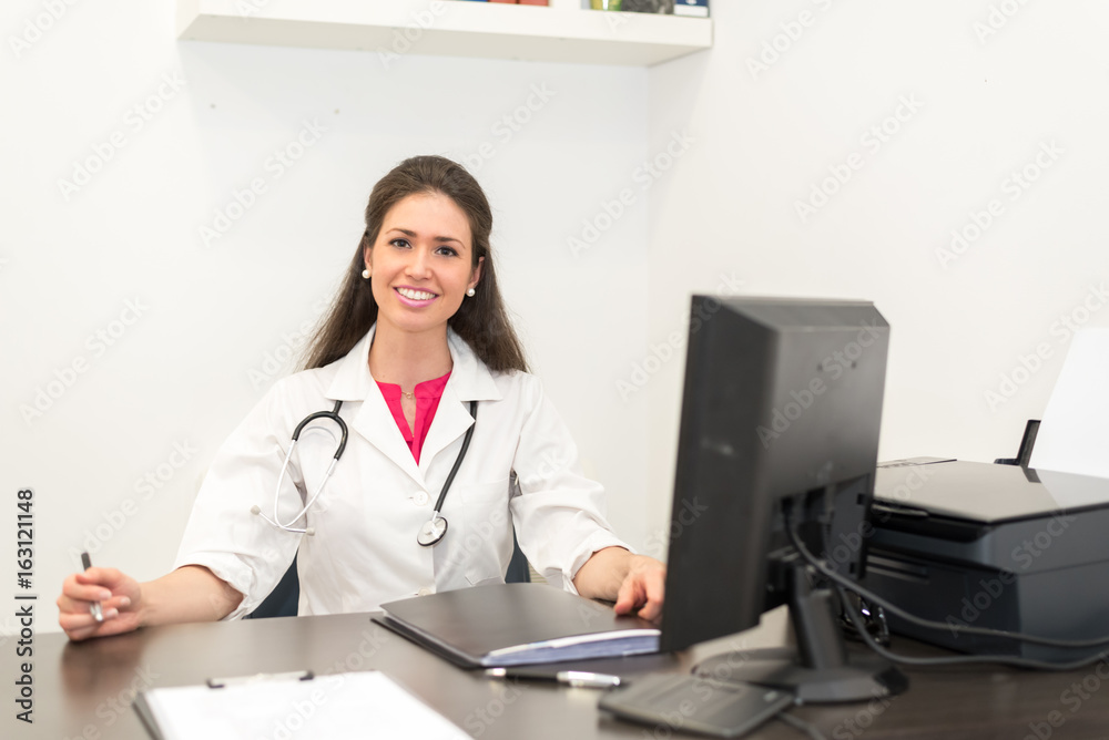 Female doctor working on computer Female doctor working on computer