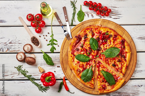 Pizza and filling ingredients.