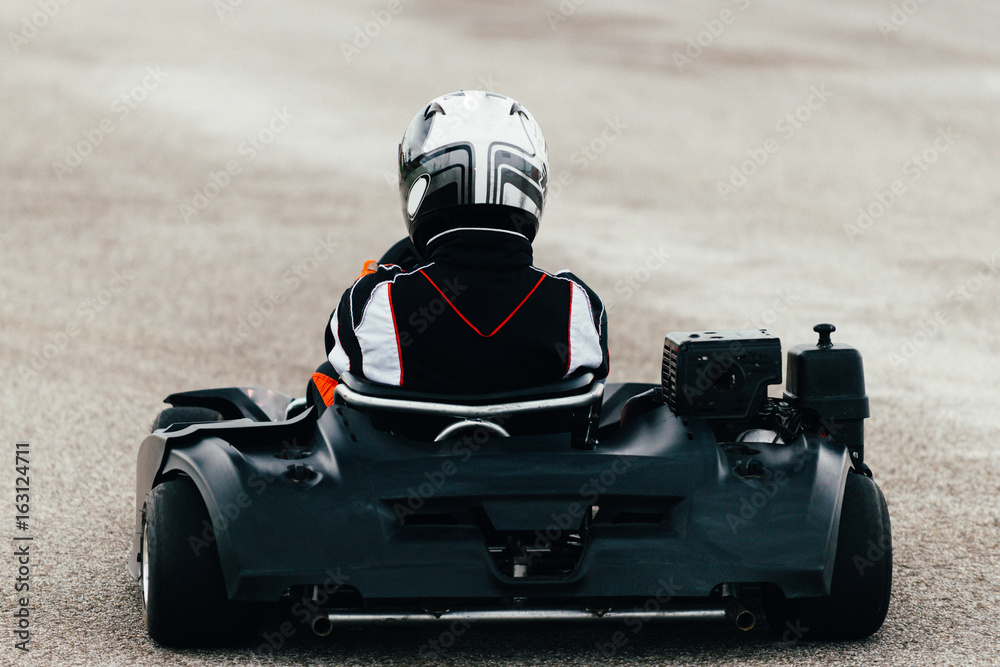 Woman driving go-cart