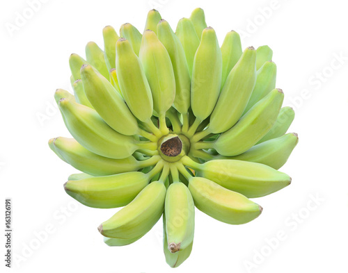 Green banana isolated on white background. © surasak