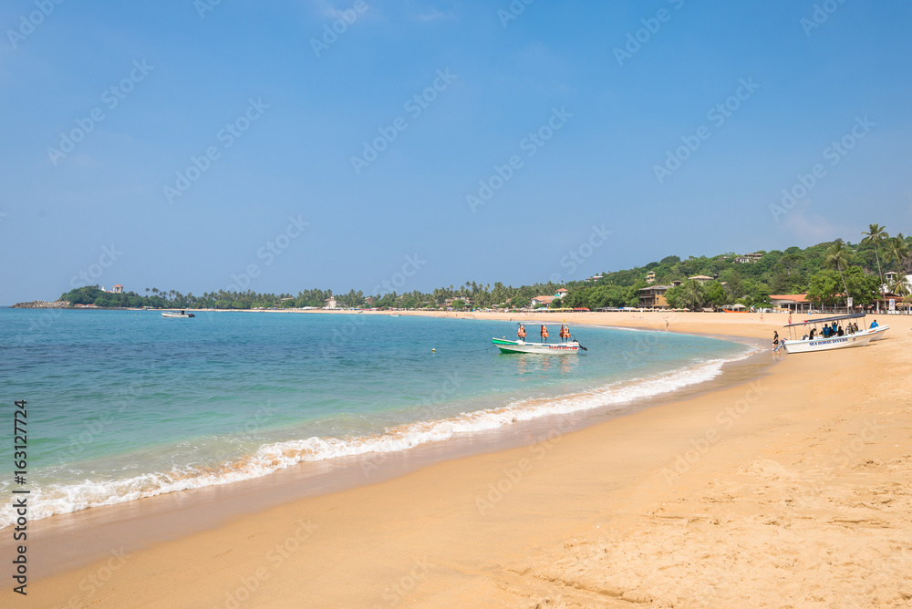 At the beach of Unawatuna, one of the major tourist spots in the south west of Sri Lanka