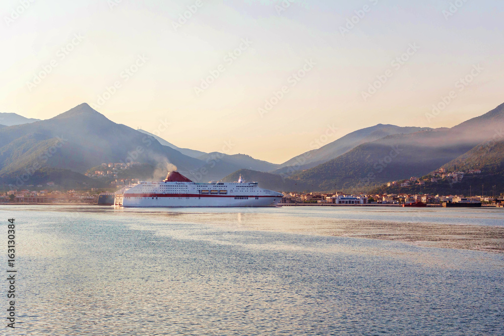 Grimaldi Minoan lines highspeed ship cruising on sunset in Greece, Corfu