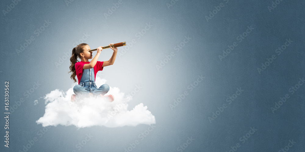Concept of careless happy childhood with girl dreaming about future Concept of careless happy childhood with girl dreaming about future