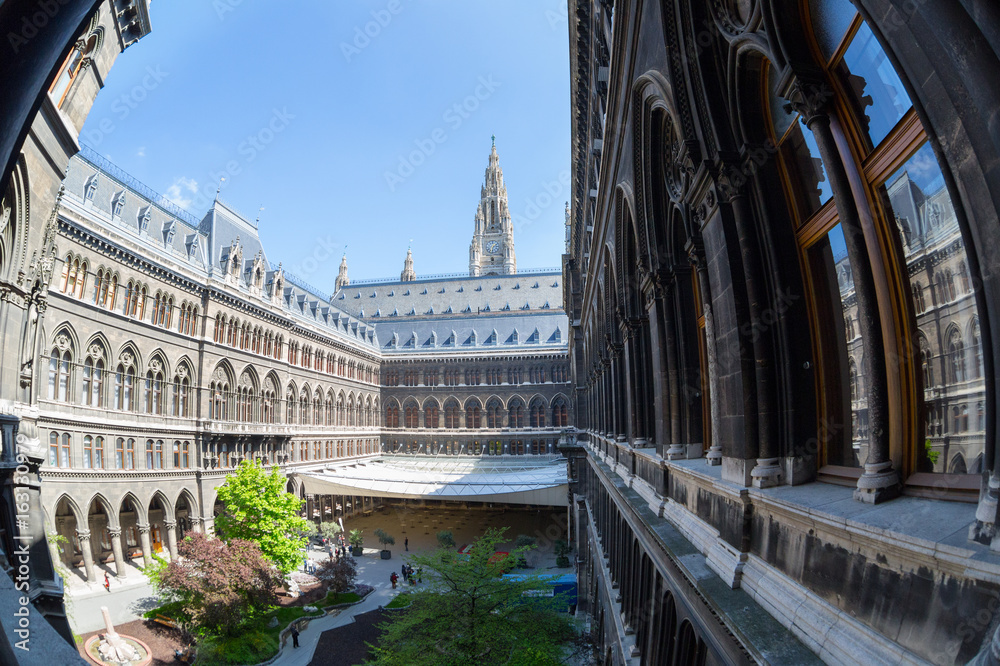 Fototapeta premium Tall gothic building of Vienna city hall , Austria, fisheye