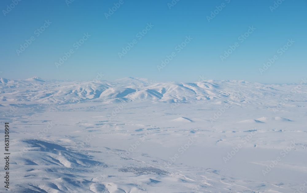 Snow-covered mountains of the Caucasus Mountains , the view from the heights