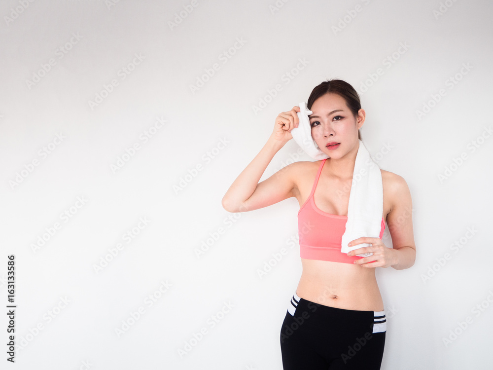 sport women are sweating with a white handkerchief,fitness concept sport women are sweating with a white handkerchief,fitness concept