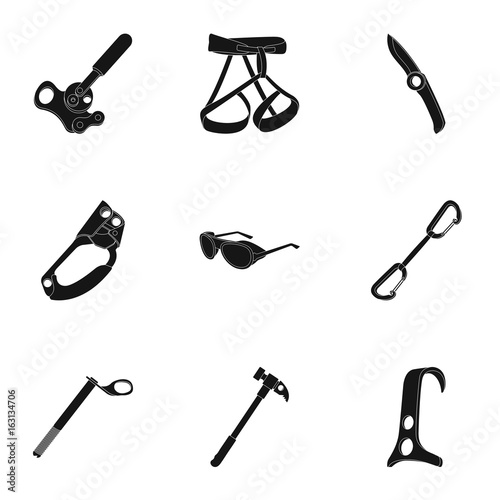 Ice ax, conquered top, mountains in the clouds and other equipment for mountaineering.Mountaineering set collection icons in black style vector symbol stock illustration web.