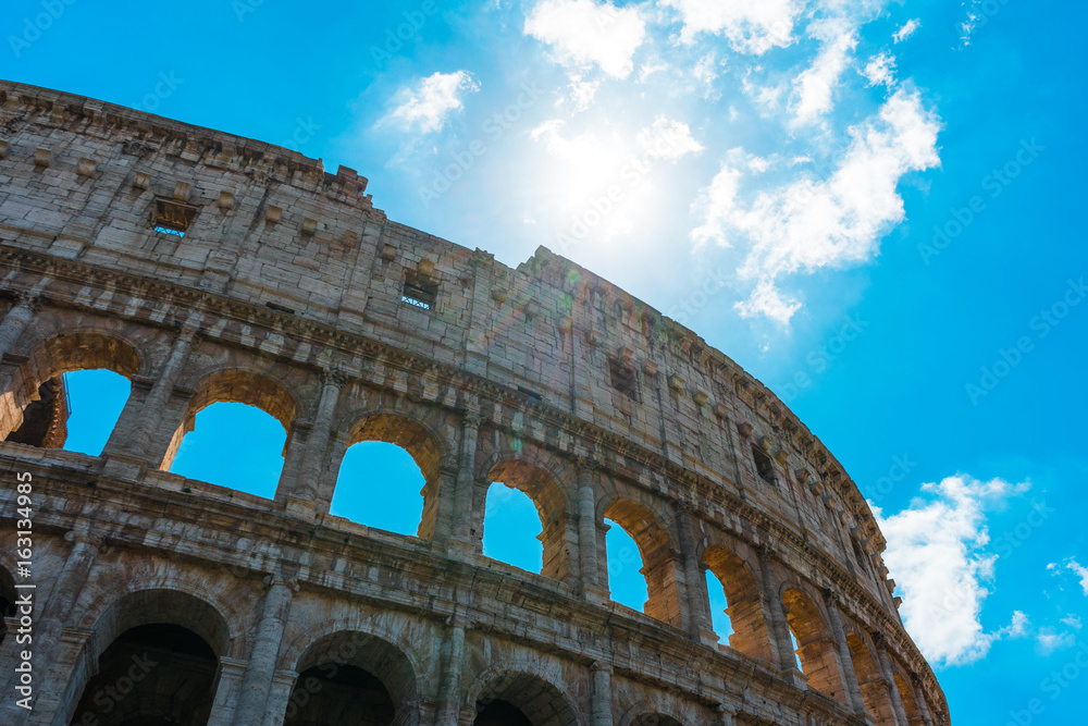 colosseum on a sunny day with beautiful clouds