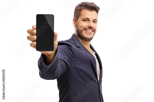 Εκτύπωση καμβά Young guy showing a phone
