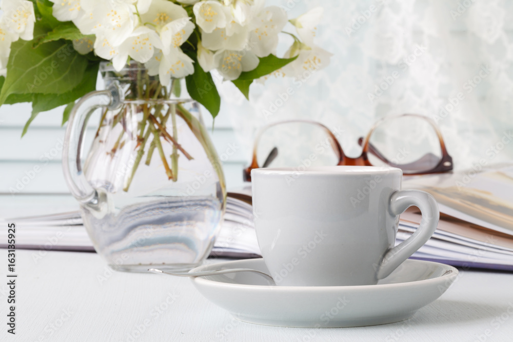 cup of coffee, flowers and note
