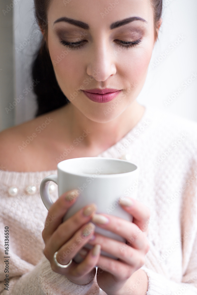 cup of coffee or tea in female hands cup of coffee or tea in female hands