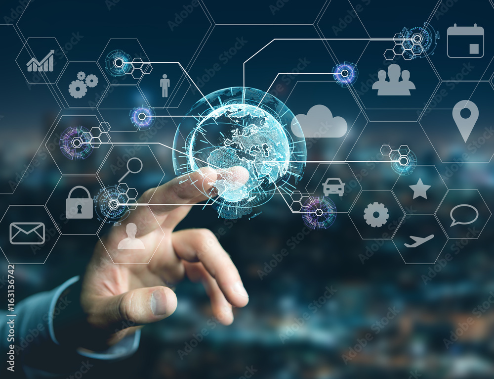 International business network connection displayed on a futuristic interface with technology icon and sphere globe - Worldwide business concept International business network connection displayed on a futuristic interface with technology icon and sphere globe - Worldwide business concept